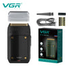 A VGR V-350 professional electric shaver in black and olive green packaging with accessories.