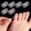 Clear silicone toe covers being placed on a person's foot for protection
