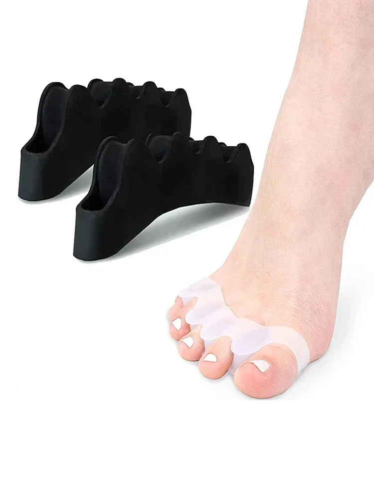 Black soft gel toe separators placed on a foot for bunion relief and toe straightening.