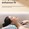 A woman is using an electric massage pillow for a stretch, focusing on her neck and back.