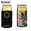 A black Kemei MAX foil shaver with a gold-colored head and packaging visible.