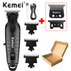 A black Kemei professional cordless hair trimmer with various attachments and a box.