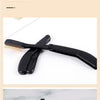 Un peigne pliable en acier inoxydable noir pour cils et sourcils.