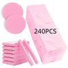 Pink compressed facial sponges stacked and loose, showing various shapes for cleansing and makeup removal.