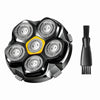 A black magnetic replacement shaving head with multiple rotating blades and a black handle.