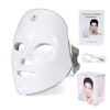 A white LED facial therapy mask is shown with its accompanying light beauty instrument and packaging.