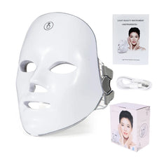 A white LED facial therapy mask is shown with its accompanying light beauty instrument and packaging.