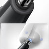 Close-up of a black electric nose and eyebrow hair trimmer head designed to prune hair safely.