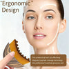 A woman's face shows lines indicating lymphatic drainage points, with a hand holding a wooden facial tool.
