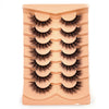 Plateau en plastique contenant plusieurs rangées de faux cils de renard dramatiques pour maquillage des yeux.