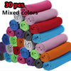 A stack of 30 mixed color ultra soft quick-dry sport towels for gym and travel.