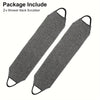 Two gray shower back scrubbers are shown diagonally against a white background.