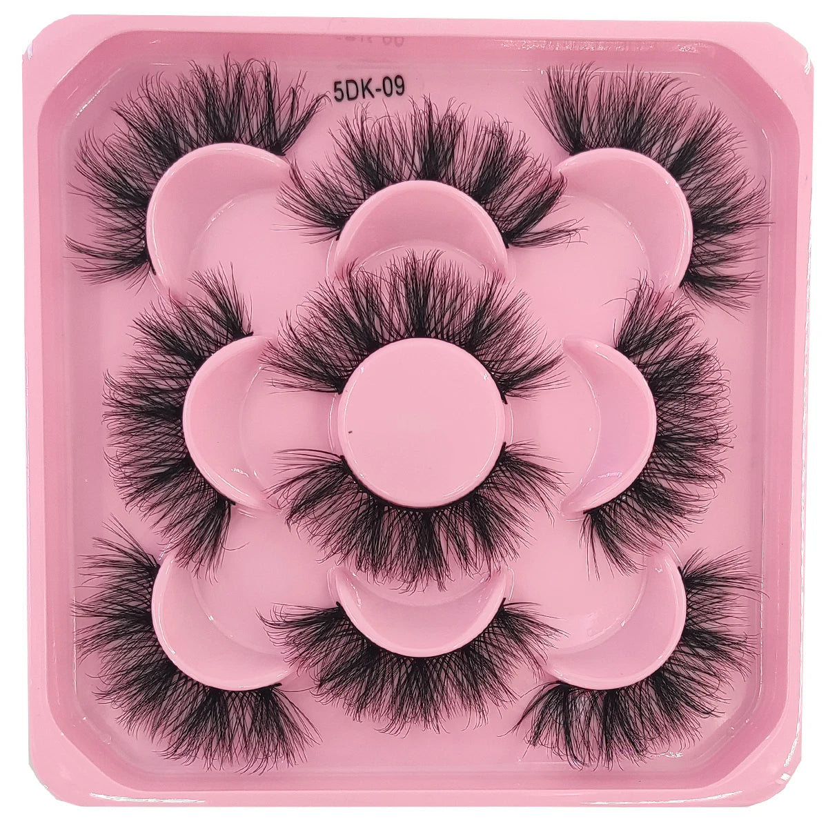 A pink plastic tray holding a set of black artificial mink eyelashes