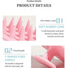 Peigne en silicone rose avec poignée fixe pour soins capillaires et massage du cuir chevelu.