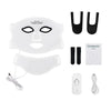 A white LED facial mask set including a face mask, silicone pads, and power cord.
