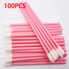 A set of 100 pink precision makeup brushes with white tips arranged in a row.