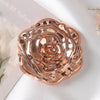 A rose-shaped vintage double-sided pocket makeup mirror with a rose gold finish.