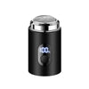 A black electric shaver with a silver head and a digital display showing 100% battery.