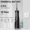 A black portable rechargeable oral irrigator is shown next to a wall outlet and various charging options.