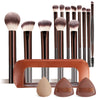 A set of thirteen professional makeup brushes in various shades displayed with a leather storage case and brush heads.