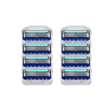 A set of reusable stainless steel shaving heads with blue and light blue accents.
