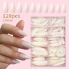 A hand holds a box of 120 press-on nails in various sizes and colors.