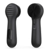 A black silicone facial cleansing brush with a textured head and a smooth handle.
