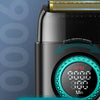 Close-up of a black electric trimmer with a titanium coating foil and an RPM display showing a range of speeds from 7000 to 9