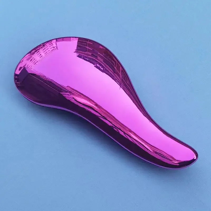 A glossy magenta detangling hair brush is shown against a light blue background.