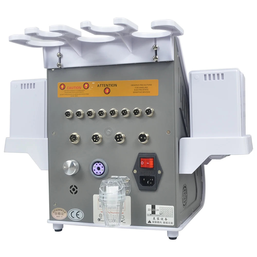 A gray electronic tool with multiple massage attachments and a clear glass component for hand massage and body slimming.