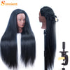 Long black hair extension installed on a mannequin head for cosmetology practice