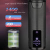 A close-up view of a professional rotary hair trimmer with a black body and an LCD display showing battery percentage.