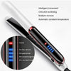 A close-up view of a professional hair straightener with various temperature settings displayed on the control panel.