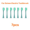 Seven replacement green bristles for an Ocean electric toothbrush.