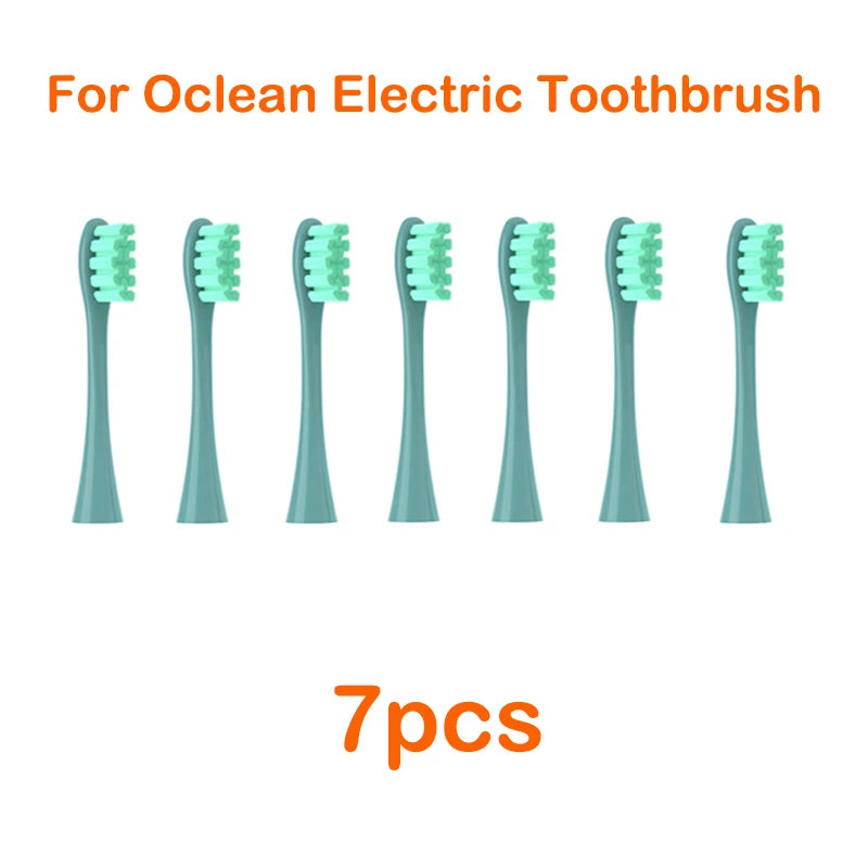 Seven replacement green bristles for an Ocean electric toothbrush.