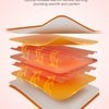 Cross-section view of a new generation heating pad showing layered orange and white textile pads.
