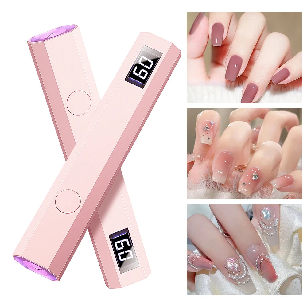 Pink portable rechargeable UV LED nail dryer with multiple tips shown on fingers