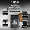 A black Kemei electric beard shaver with a push switch and Type-C charging interface shown on a white background.