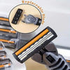 Close-up of a stainless steel safety razor with a replaceable triple-blade head and a replacement blade shown separately.