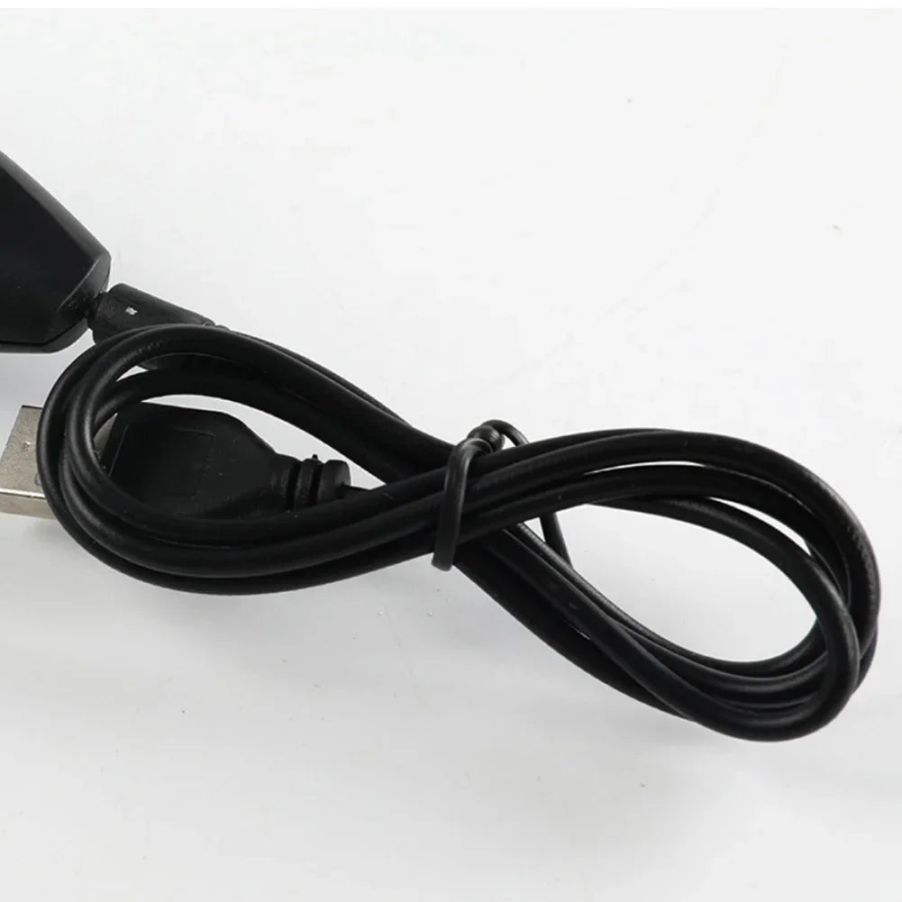Black electric twist braiding tool with a cord and connector.