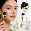 A woman is using a gold titanium micro derma roller tool on her face, with various related products visible.