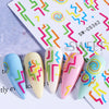 Colección de calcomanías de uñas coloridas con remolinos y líneas abstractas sobre fondo blanco.
