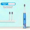 Blue elephant themed electric toothbrush with three brush heads displayed on a white shelf.