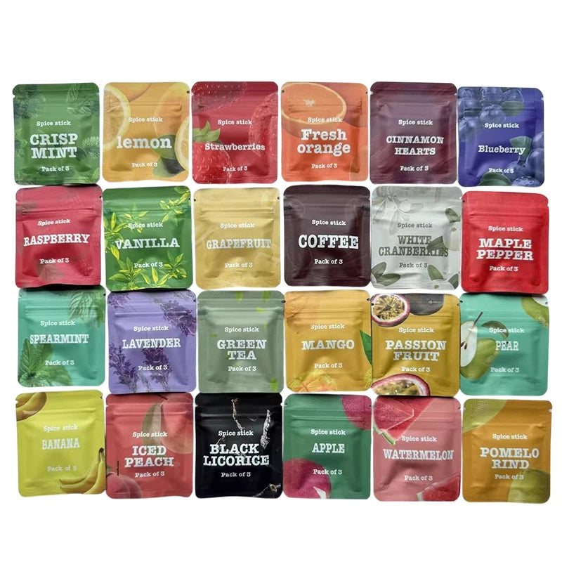 Collection d'huiles essentielles en bâtonnets d'épices de différentes couleurs et emballages.