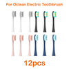 A set of 12 replacement brush heads for an Ocean electric toothbrush in various colors and shapes.