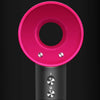 A close-up view of a pink and silver brushless motor component for an aircraft add-on motor.