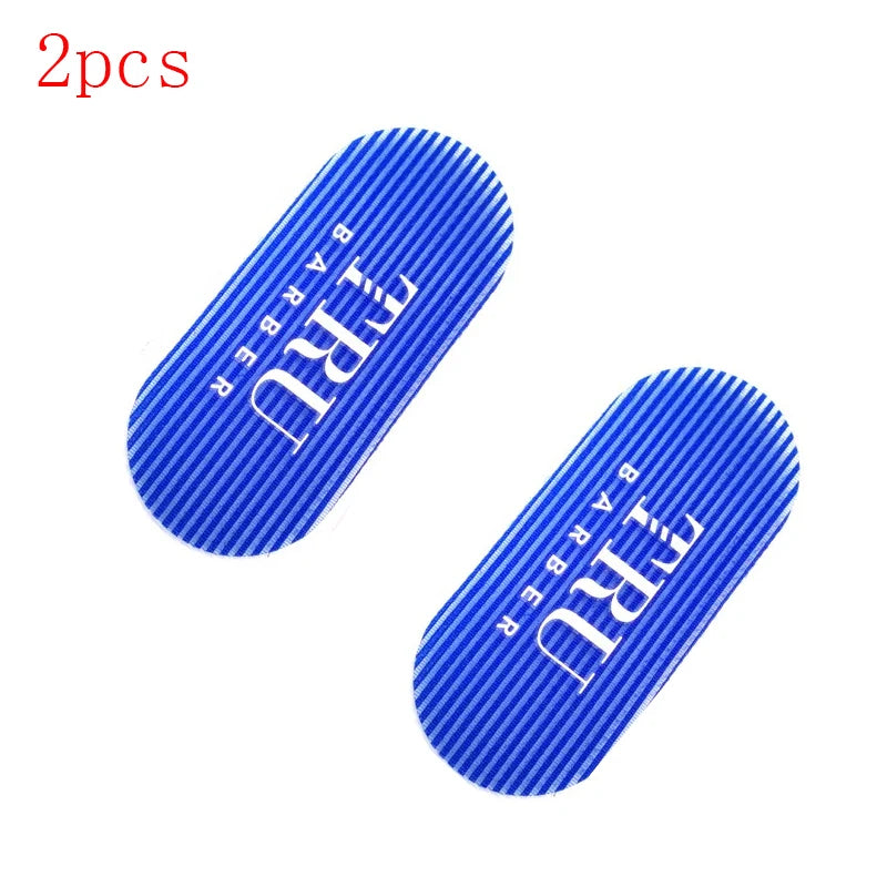 Deux pinces à cheveux plastiques bleues doubles ou outils de coiffure, montrés en diagonale.