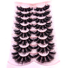 A display of natural mink striped false eyelash extensions arranged in rows on a pink background.
