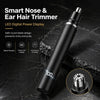 A black smart nose and ear hair trimmer with a LED digital power display shown on a dark surface.