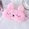Máscara de ojos de peluche de conejo rosa con ojos cerrados y lazo rosa